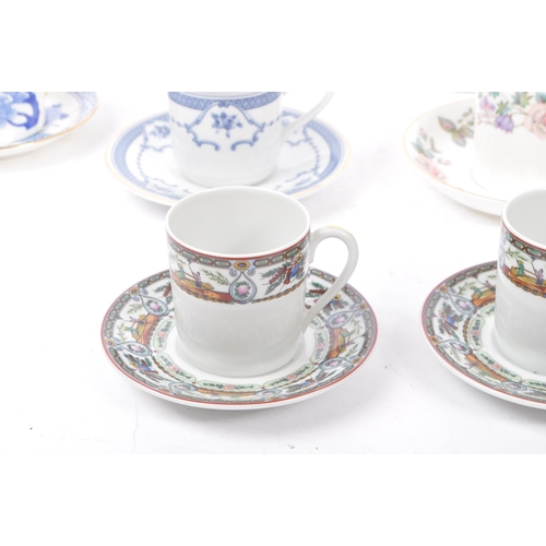 390 - A collection of 20th century fine china porcelain coffee cups and saucers. The collection to include... 