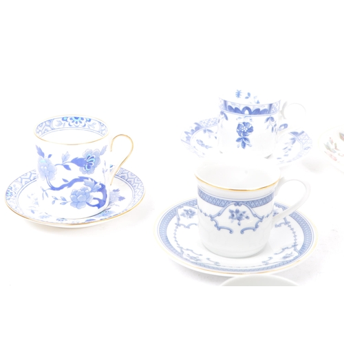 390 - A collection of 20th century fine china porcelain coffee cups and saucers. The collection to include... 