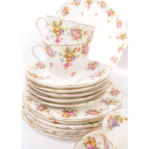 395 - Royal Doulton - An early 20th Century china porcelain tea service in a floral / fruit pattern, compr... 