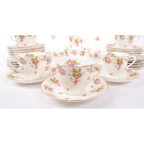 395 - Royal Doulton - An early 20th Century china porcelain tea service in a floral / fruit pattern, compr... 