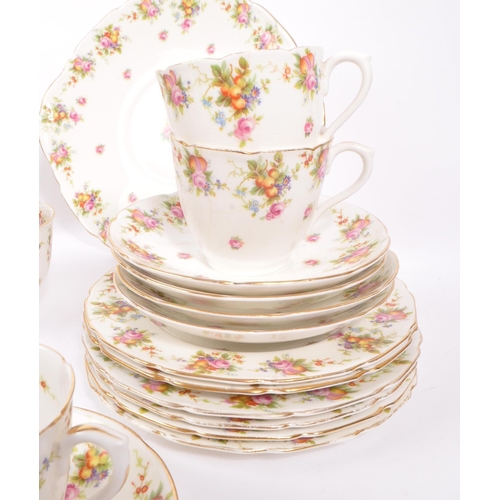 395 - Royal Doulton - An early 20th Century china porcelain tea service in a floral / fruit pattern, compr... 