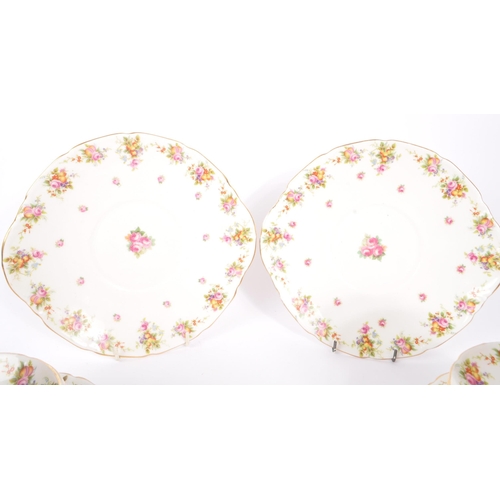 395 - Royal Doulton - An early 20th Century china porcelain tea service in a floral / fruit pattern, compr... 