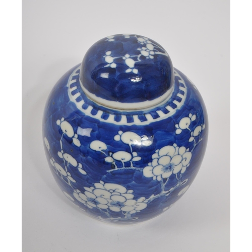 397 - A 19th century Qing dynasty blue & white lidded prunus ginger jar. With character marks to underside... 