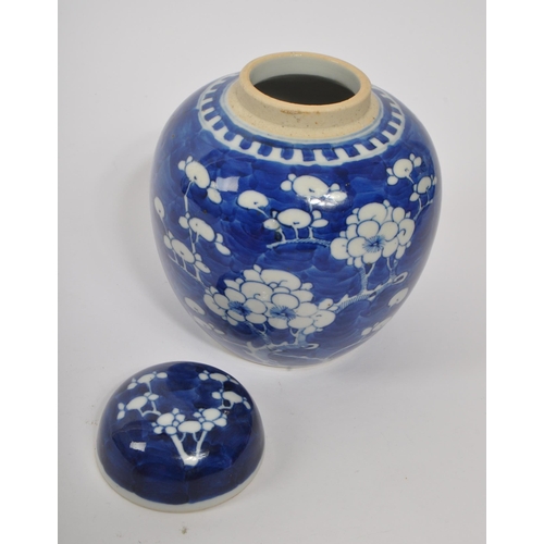 397 - A 19th century Qing dynasty blue & white lidded prunus ginger jar. With character marks to underside... 