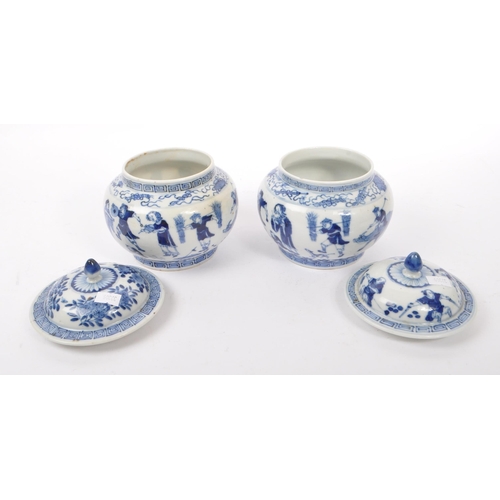 40 - A pair of early 19th Century Qing dynasty Chinese porcelain blue and white lidded pots of squat bulb... 