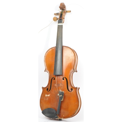 401 - Two early 20th century violin stringed musical instruments. Having a spruce wooden body with tuning ... 