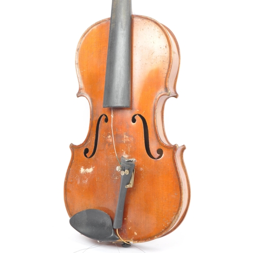 401 - Two early 20th century violin stringed musical instruments. Having a spruce wooden body with tuning ... 