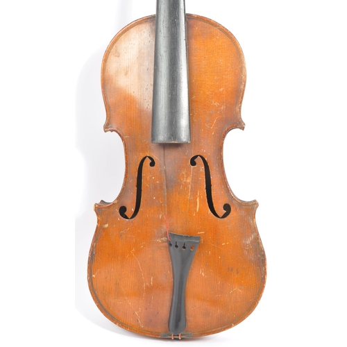 401 - Two early 20th century violin stringed musical instruments. Having a spruce wooden body with tuning ... 