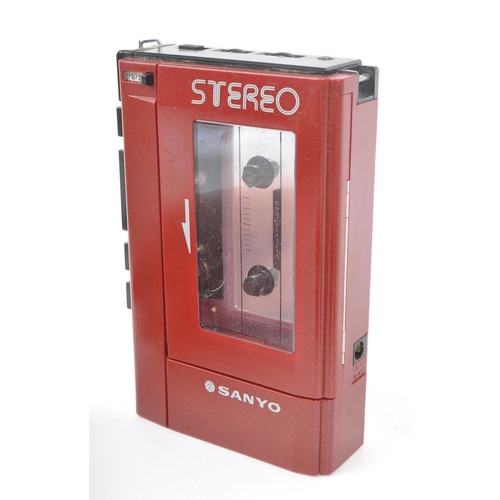 404 - Sanyo / Aiwa - A collection of three cassette players to include Sanyo M1118 standard compact casset... 