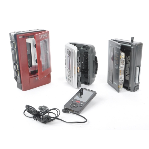 404 - Sanyo / Aiwa - A collection of three cassette players to include Sanyo M1118 standard compact casset... 