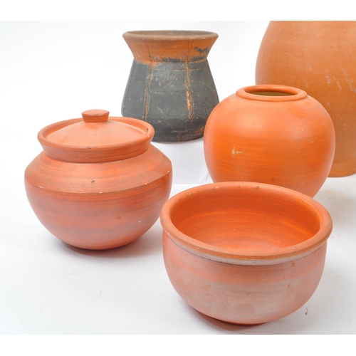 42 - A collection of 20th century believed North African, red slip ware manner terracotta pottery. The co... 