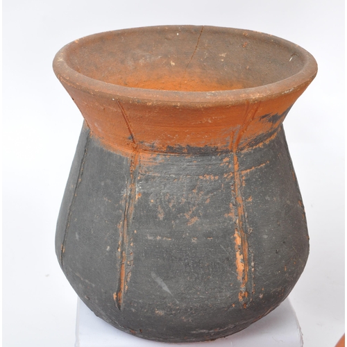 42 - A collection of 20th century believed North African, red slip ware manner terracotta pottery. The co... 