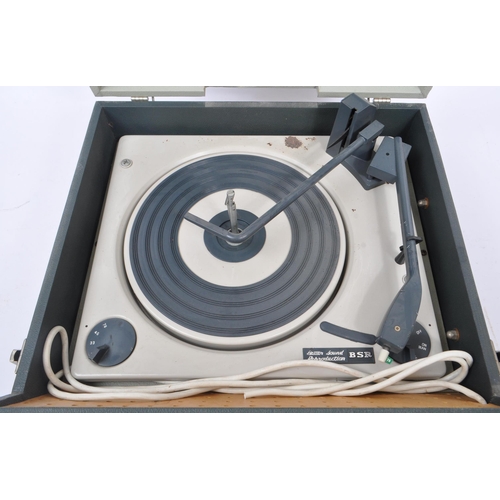 421 - A 20th century Dansette Viva portable record turntable deck with BSR desk. Measures 42cm x 29cm x 18... 