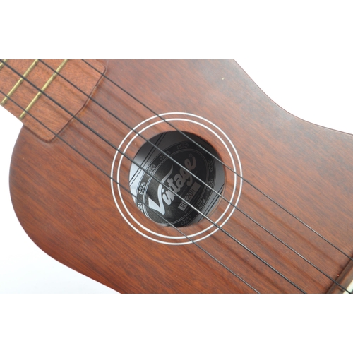 429 - Vintage - A 20th century Vintage brand VUK20N ukulele. The ukulele having a wooden body. Makers labe... 