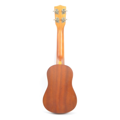 429 - Vintage - A 20th century Vintage brand VUK20N ukulele. The ukulele having a wooden body. Makers labe... 