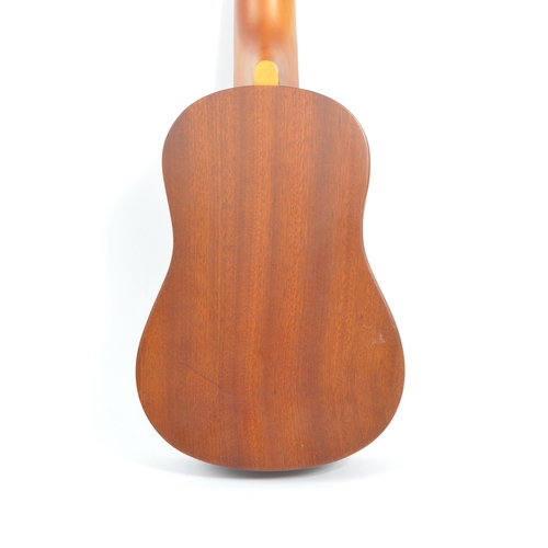 429 - Vintage - A 20th century Vintage brand VUK20N ukulele. The ukulele having a wooden body. Makers labe... 