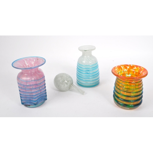 43 - Mdina - A collection of three Mdina glass trailed maltese vases comprising of a pink glass vase and ... 