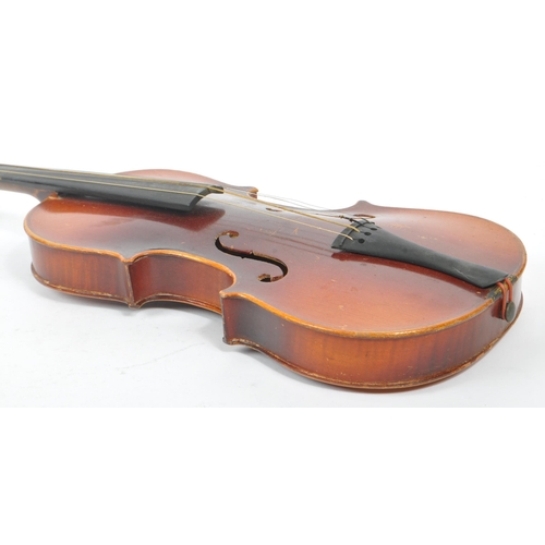 436 - An early 20th Century two piece back full size 4/4 violin musical instrument having ebonised fingerb... 