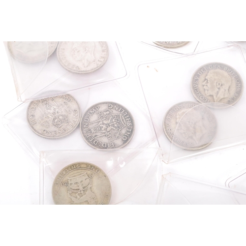 485 - A collection of approximately 48 British pre-1947 1920s, 1930s, 1940s one shilling coins. Mixed silv... 