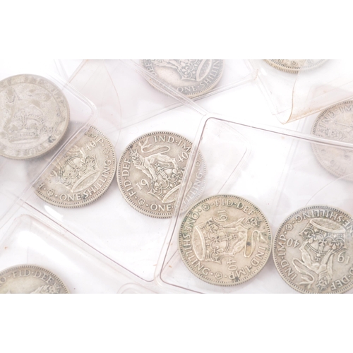 485 - A collection of approximately 48 British pre-1947 1920s, 1930s, 1940s one shilling coins. Mixed silv... 