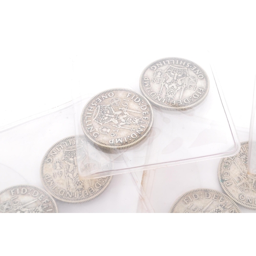 485 - A collection of approximately 48 British pre-1947 1920s, 1930s, 1940s one shilling coins. Mixed silv... 