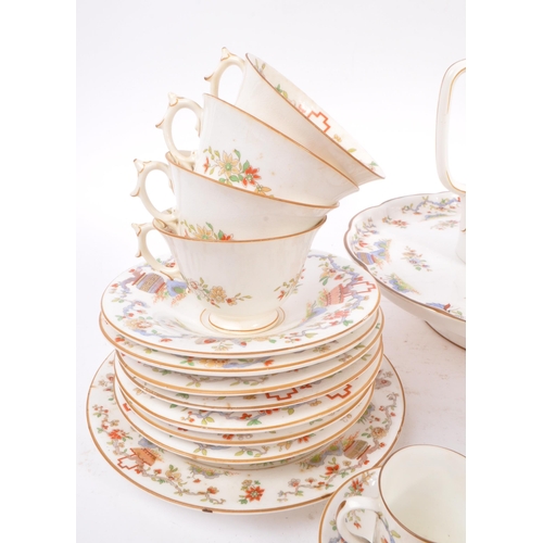 50 - Royal Worcester - An English porcelain china George V tea / coffee set circa 1922 to include cups, s... 