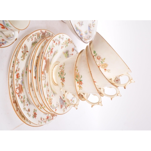 50 - Royal Worcester - An English porcelain china George V tea / coffee set circa 1922 to include cups, s... 