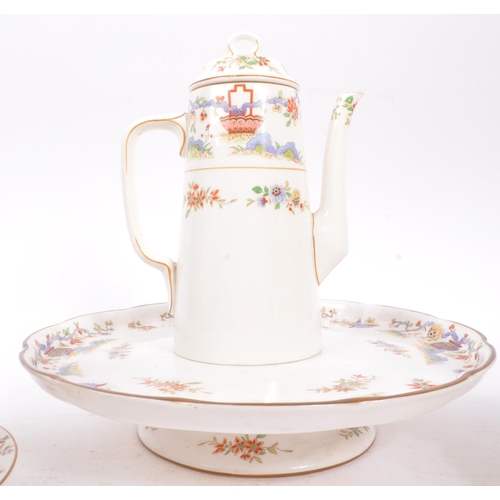 50 - Royal Worcester - An English porcelain china George V tea / coffee set circa 1922 to include cups, s... 