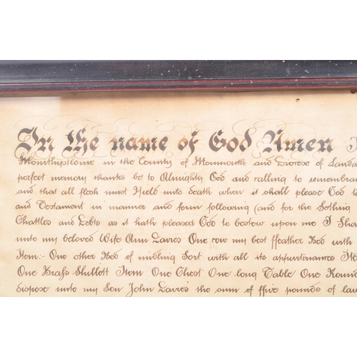 507 - An 18th Century 1738 framed and glazed last will and testament for a Mr John Davies of Monmouth. He ... 