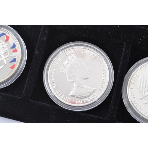 514 - Royal Mint - A collection of thirteen Queen Elizabeth II Golden Jubilee collection 2002 Falkland Isl... 