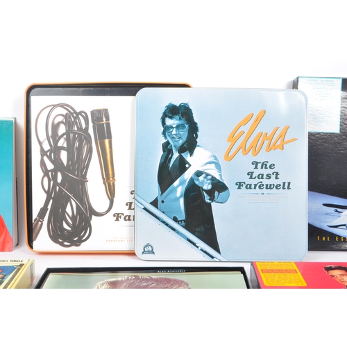 521 - Elvis Presley. A collection of  CD box sets and an uncommon Jimmy Ellis book. The lot comprising Elv... 