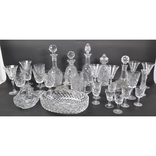 54 - A large collection of 20th Century vintage cut glass crystal items to include five decanters with st... 