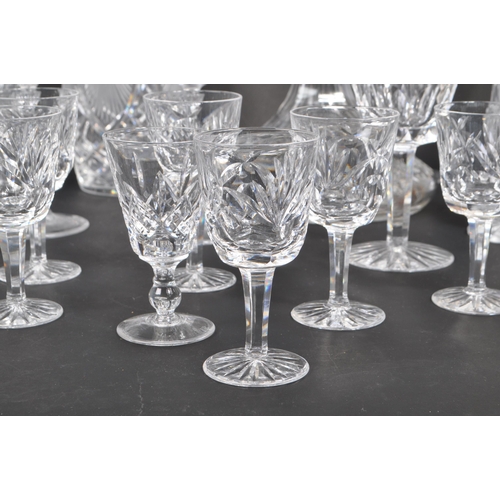 54 - A large collection of 20th Century vintage cut glass crystal items to include five decanters with st... 