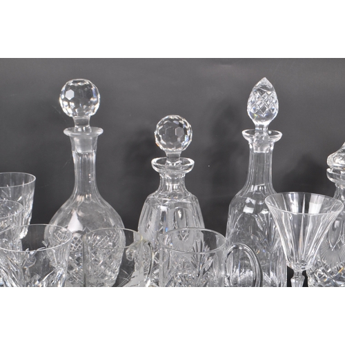 54 - A large collection of 20th Century vintage cut glass crystal items to include five decanters with st... 