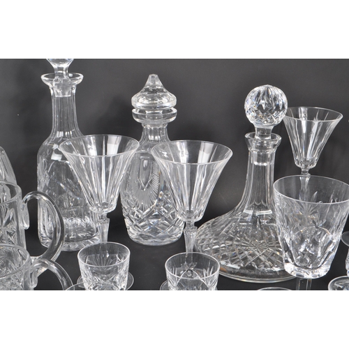 54 - A large collection of 20th Century vintage cut glass crystal items to include five decanters with st... 