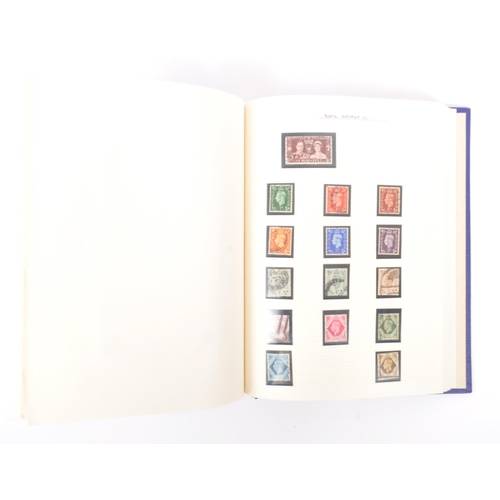 546 - A collection of 19th and 20th century British postal stamps. The stamps housed in a single stamp alb... 