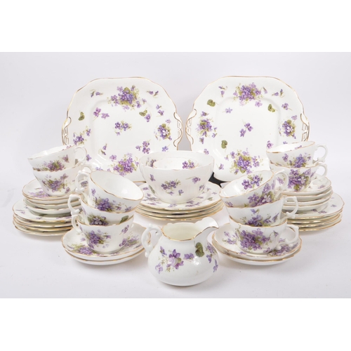 58 - Hammersley & Co. - An early 20th century Hamersley & Co. Violet Pattern part tea service. The tea se... 