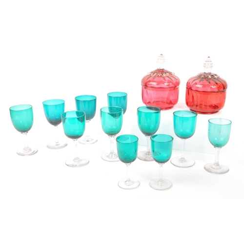 59 - A collection of eleven turquoise stemmed drinking / display glasses. Of various sized with coloured ... 