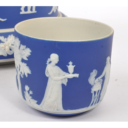 64 - A collection of Wedgwood Jasperware manner decorative ceramic pieces. The collection to include a la... 