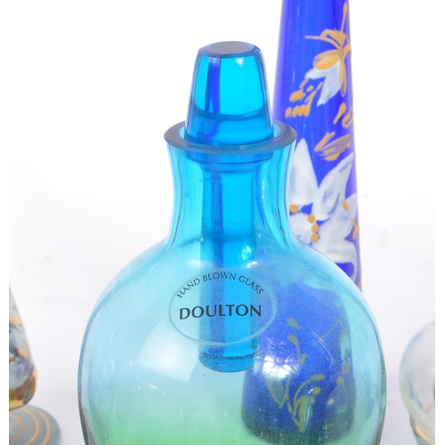 66 - A collection of early and mid 20th century studio art glass perfume bottles. The collection to inclu... 