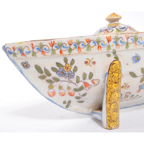 7 - A 18th Century French Faience ink pot stand. In the form of a boat and ceramic construction. With ha... 