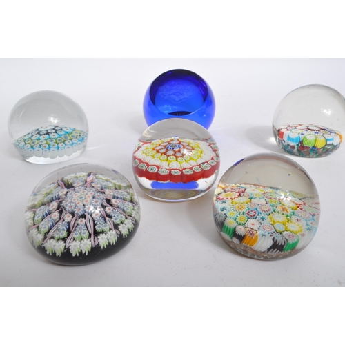 81 - A collection of 20th century millefiori studio art glass paperweights. The collection to include fiv... 