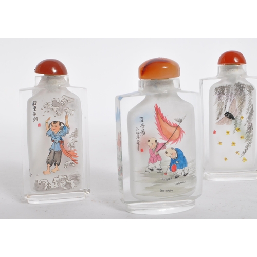 83 - A collection of six vintage 20th century Chinese glass scent bottles.The scent bottles each of recta... 