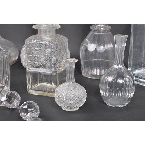 87 - A collection of early to late 19th century George III & Victorian cut glass decanters. To include ri... 