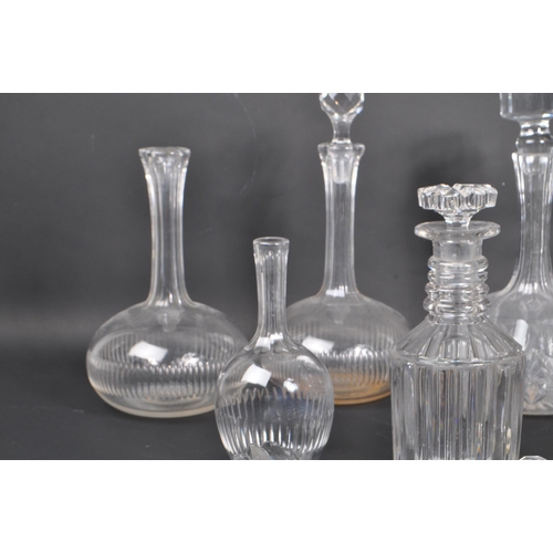 87 - A collection of early to late 19th century George III & Victorian cut glass decanters. To include ri... 