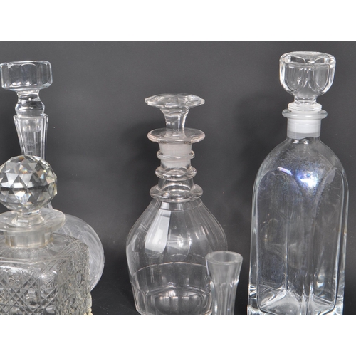 87 - A collection of early to late 19th century George III & Victorian cut glass decanters. To include ri... 