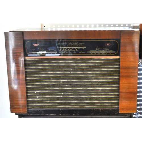 423 - A collection of vintage mid 20th century valve radios. The collection to include a Marconi T.9A radi... 