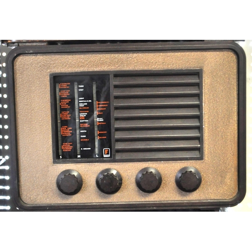 423 - A collection of vintage mid 20th century valve radios. The collection to include a Marconi T.9A radi... 