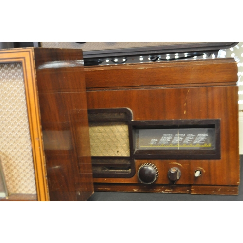 423 - A collection of vintage mid 20th century valve radios. The collection to include a Marconi T.9A radi... 