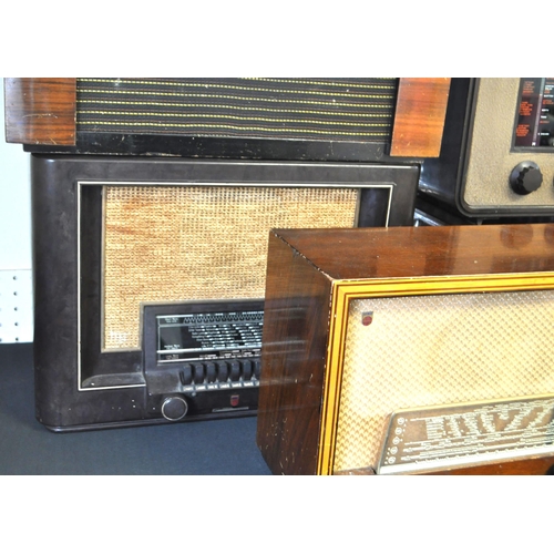 423 - A collection of vintage mid 20th century valve radios. The collection to include a Marconi T.9A radi... 